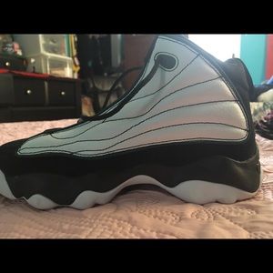 White ,green and black Jordan’s